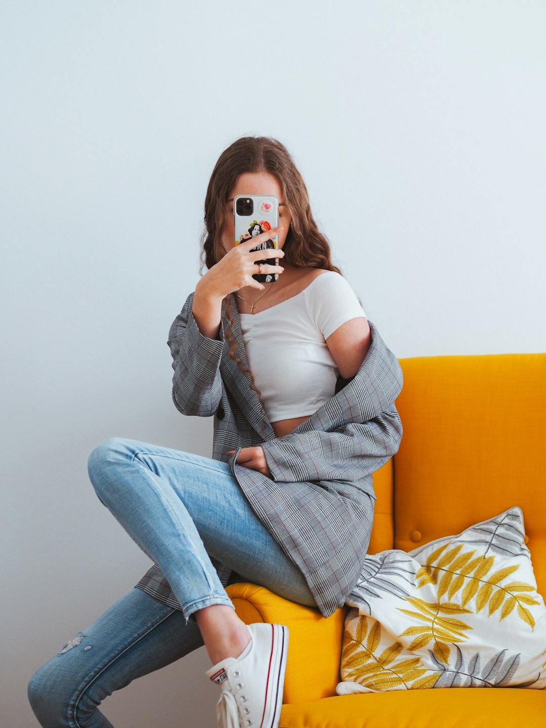 celebrity influencer posing with phone