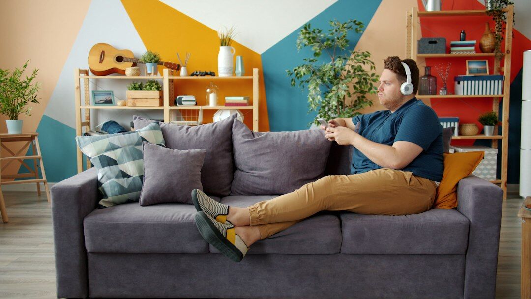 person using phone at home
